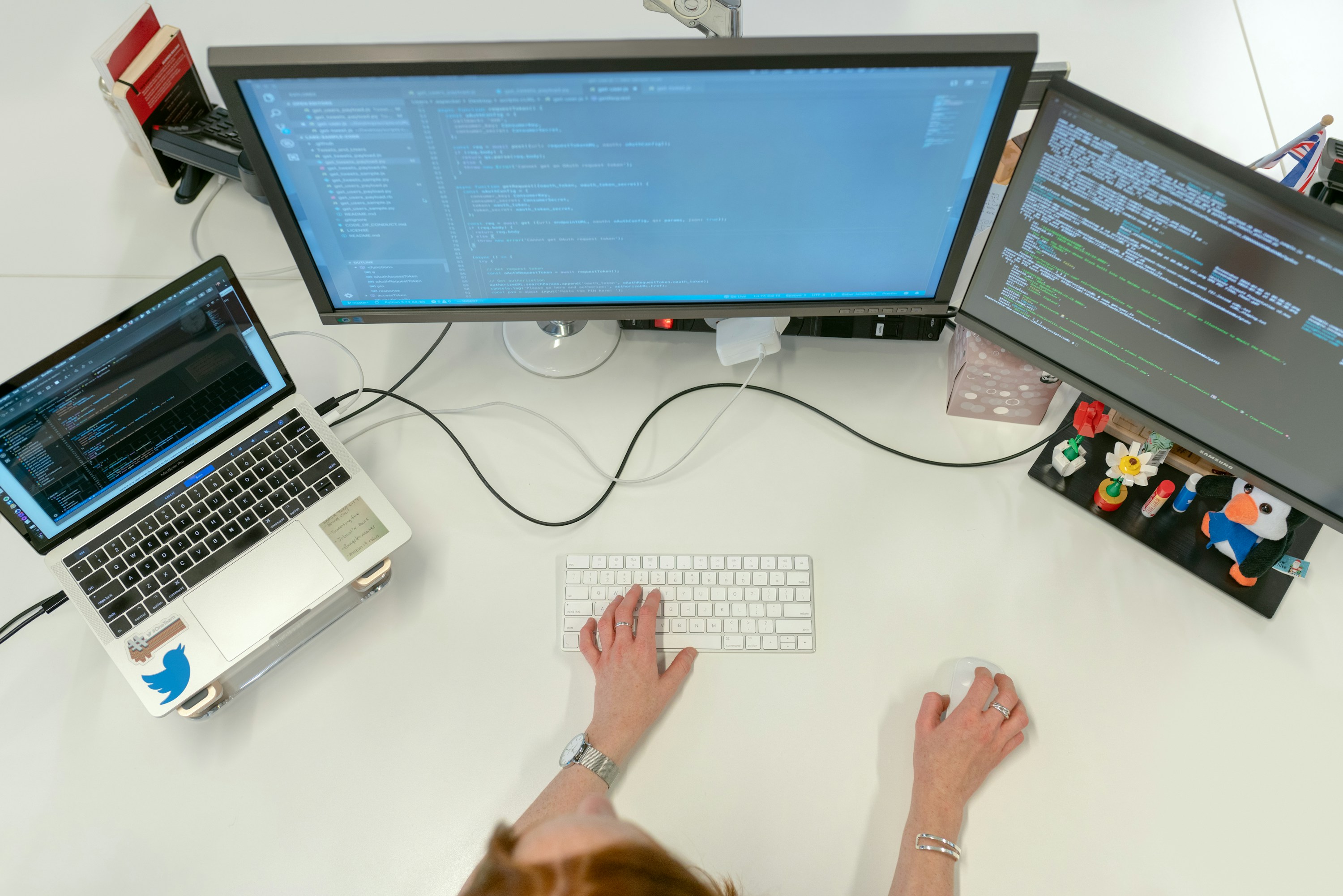 A software workstation with several connected screens